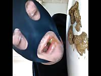 Masked man eating her own poop