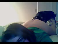 Nerd chick getting her pussy eaten by dog