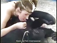 Blonde babe giving blowjob to dog