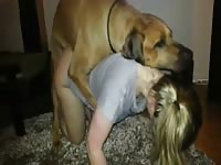 Blonde girl enjoying her dog's cock amateur beastiality