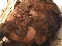Teen having poop rubbed all over her face