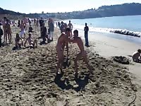 Naughty gays getting naked on the beach