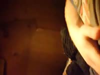 Black dog giving blowjob to man